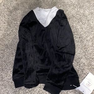 Girls size 8 sweater with white around neck